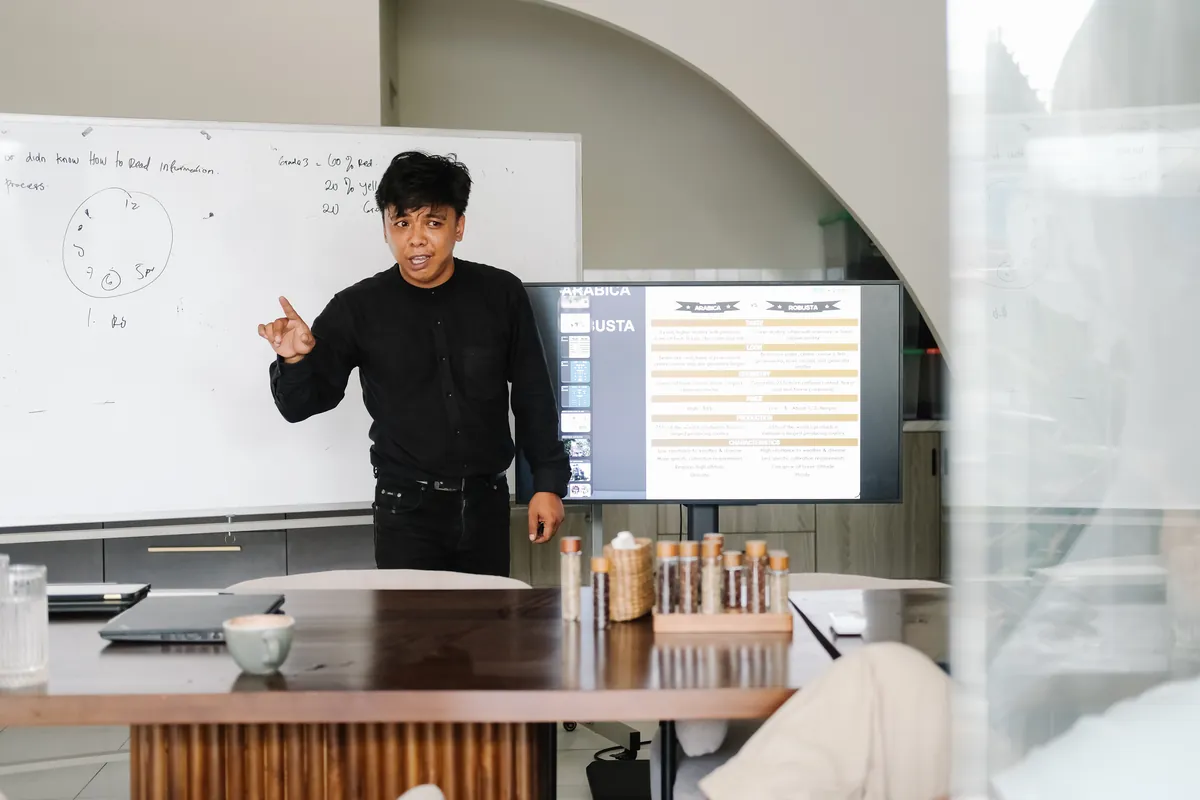 An instructor teaching coffee from bean to cup