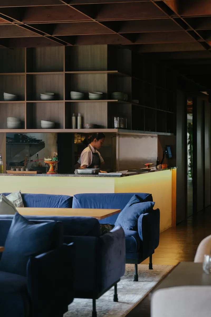 Lounge seating beside the open kitchen