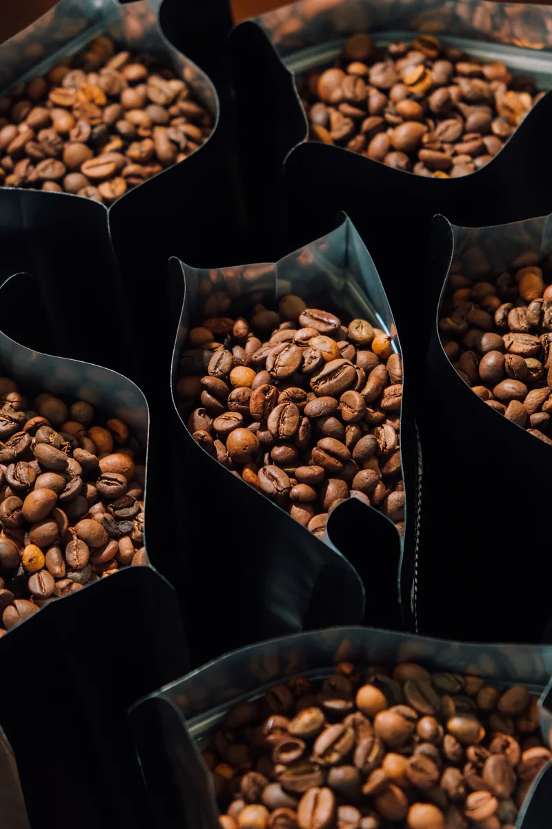 Bags of freshly roasted Meet me Coffee beans