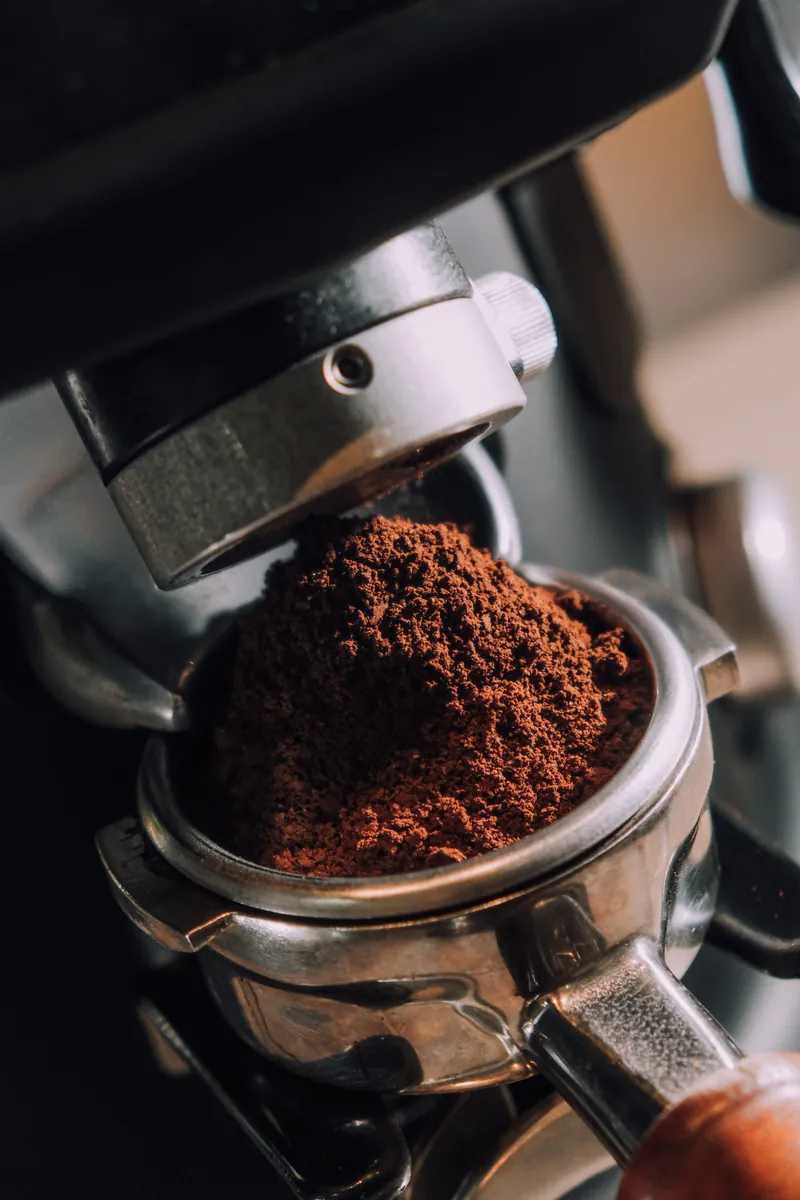 Freshly ground Meet me Coffee in a portafilter
